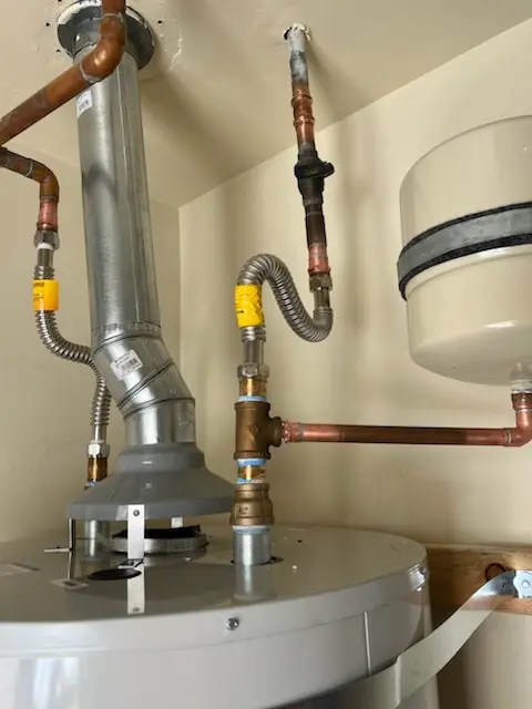 Water heater installation and plumbing repair in Windfall Heights